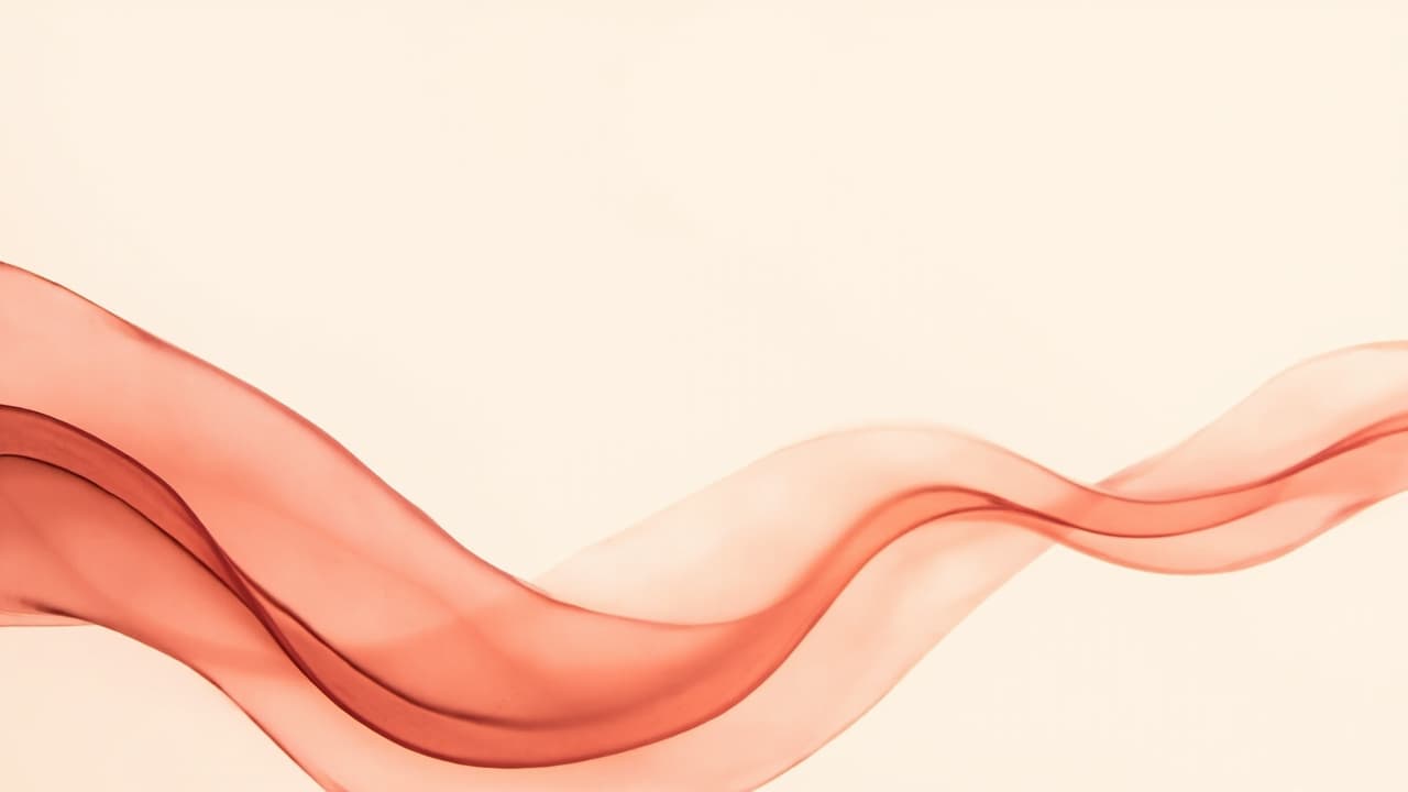 Abstract artwork of two slender red ribbons of light spiralling around a shared axis